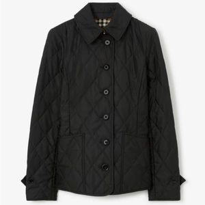 Size M black Quilted Burberry jacket. NWT. Excellent condition.